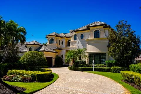 Upper class Naples Florida coastal beach homes Stock Photos