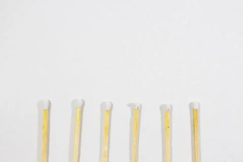 Upper close-up half shot of orderly positioned multiple white match head cove Stock Photos