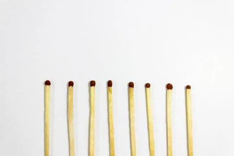 Upper close-up half shot of orderly positioned multiple black match head cove Stock Photos