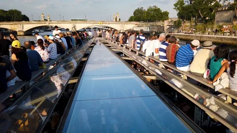The upper deck on a Seine River cruise going under a bridge 스톡 동영상 113073530