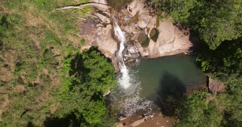 Upper Diyaluma Waterfall Cascades Flowing Down a Steep Rock Face, Sri Lanka Stock Footage 324559704