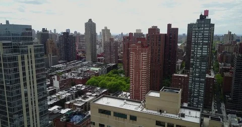 Upper East Side Towers and Tree-Lined Manhattan Blocks Stock Footage 75568365