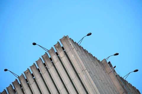 Upper edge of the building with lanterns. Stock Photos