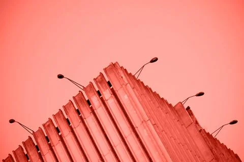 Upper edge of the building with lanterns Stock Photos