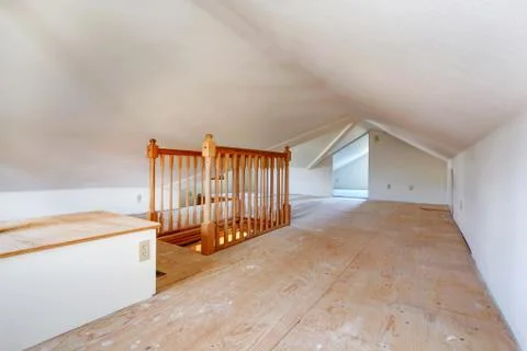 Upper empty room with low vaulted ceiling Stock Photos