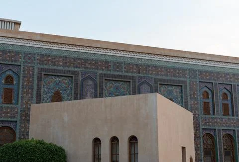 Upper Facade of Katara Mosque Displaying Ornate Blue Mosaic Tilework  Stock Photos