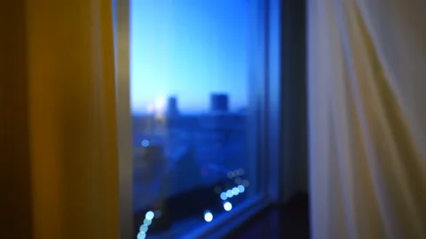Upper floor apartment or hotel room window with early morning city view. Stock Footage 105671268