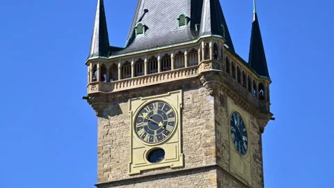 The upper gallery, turrets and clock faces of the Old Town Hall Tower against a Stock Footage 342329282