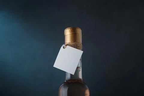 Upper part of 250 ml bottle of pink wine with blank label. Alcohol drink Foto stock