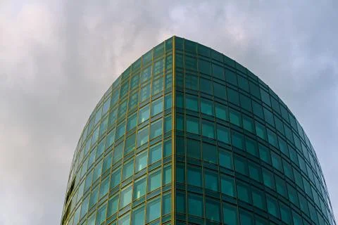 The upper part of a big modern tower Stock Photos