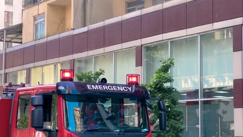 The upper part of the cabin of red fire truck, fire engine with signal lights Vídeo Stock 340444741