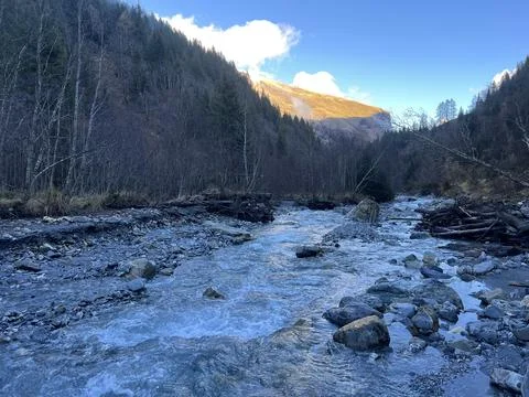 The upper part of the course of the alpine river Tamina in the Calfeisental Stock Photos