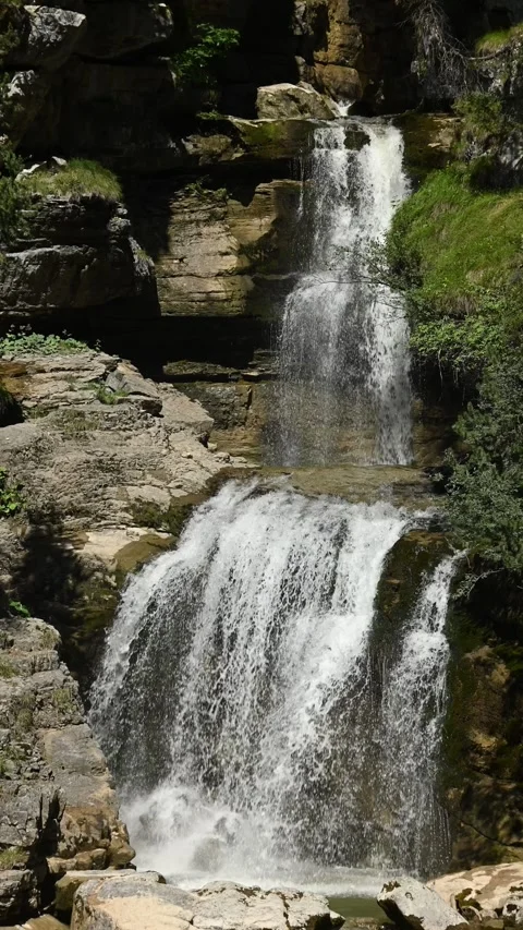 The upper part of the main waterfall at Kuhflucht Wasserfälle, vertical shot Stock-Footage 260869730