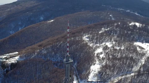 The upper part of the TV tower stands on the hill for broadcasting. Stock Footage 60416284