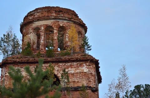 The upper round and middle square tier of the old chapel against the sky Foto stock