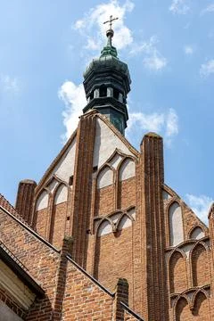 Upper section of St Martin and St Nicholas Cathedral tower in Bydgoszcz 库存照片