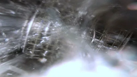 Upper spray arm spins and water pours close side view Stockbeeldmateriaal 142630640