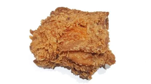 Upper thigh crispy fried chicken. Isolated on white background Stock Photos