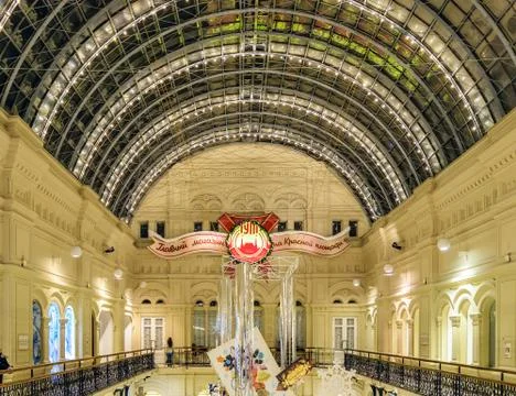 Upper tier and the vault of the central hall of GUM in Christmas holidays Stock Photos