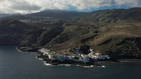 Upper view camera removes from calm ocean and resort city Stock Footage 101964584