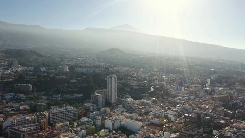 Upper view city buildings situated on island against hills Stock Footage 101961055