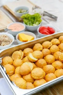 An upper view on the ingredients for mini cheeseburger making Stock Photos
