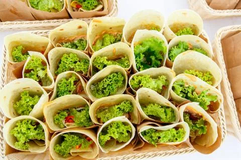 An upper view of pita bread rolls with vegetables Stock Photos