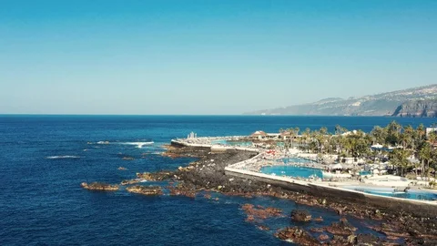 Upper view resort city hotel pools close to ocean bay 스톡 동영상 101960026