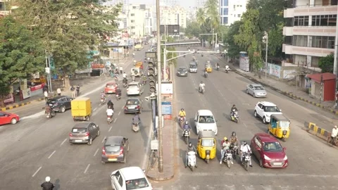 Upper view of vehicles running on a Indian road, Vehicles on a Indian road Stock Footage 147685224