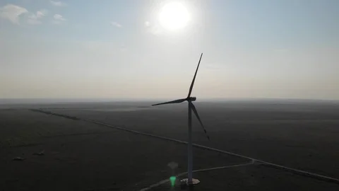 Upper view wind rotates electric generator blades at sun Video stock 103183025