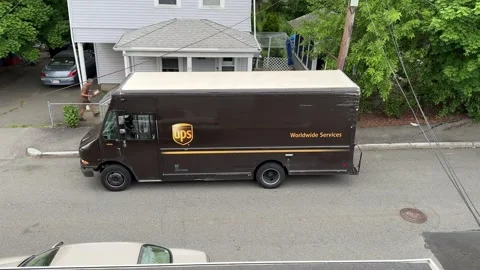 UPS driver delivers package to home Revere Mass. USA June 8 2024 Stock Footage 277427640