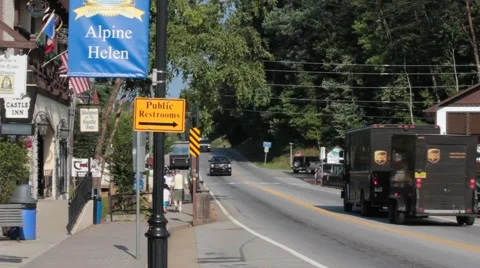 UPS passing through town Stock Footage 40218607