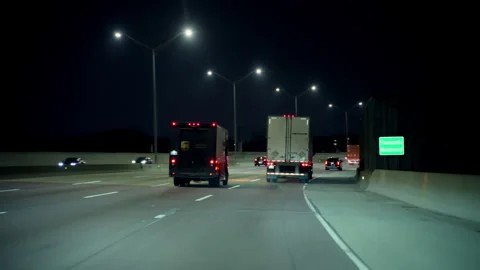 UPS United Parcel Service van driving on road of America. Night time in Stock Footage 311906960