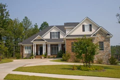 Upscale brick home Stock Photos