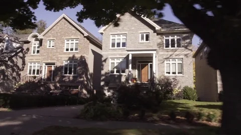 Upscale houses drive by Stock Footage 71349786