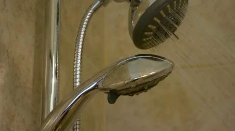 Upscale Tiled Bathroom Shower with Stainless Steel Head Stock Footage 46492748