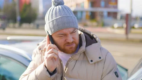 Upset and Unsettled A Driver's Emergency Call for Stock Footage 234137366