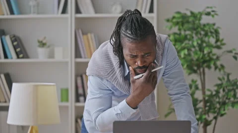 Upset black IT specialist trying to find a solution to problem, difficult task Stock Footage 197628891