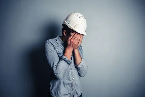Upset blue collar worker Photos