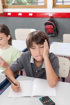 Upset boy learning 스톡 사진