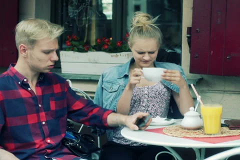 Upset boy talking with his girlfriend in the cafe Stock-Footage 54029408