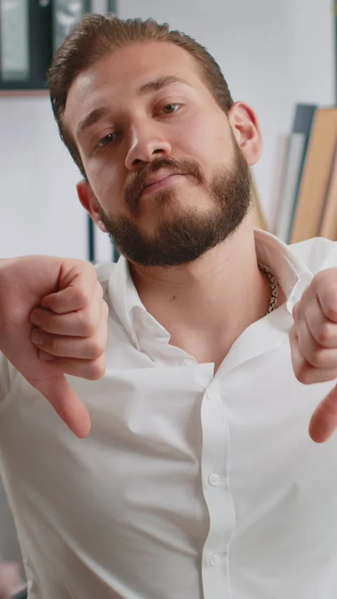 Upset businessman showing thumbs down, dislike bad work, disapproval Stock Footage 328196256