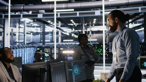 Upset data center worker packing desk after being replaced by AI Stock Photos