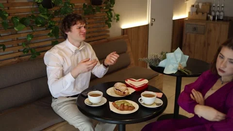 Upset guy crying at cafe table Stock Footage 328285123