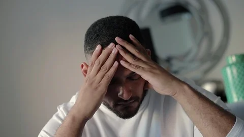 Upset Latin guy suffering from vertigo Stock Footage 101024762