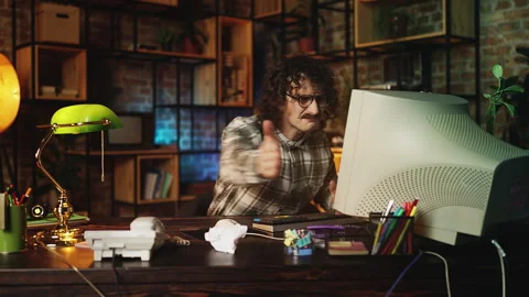 Upset male developer having problems with computer program, 90s lifestyle Stock Footage 315455997