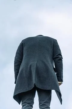 Upset Man in COat From Back Lean His Head. Headless Weird Photo Stock Photos