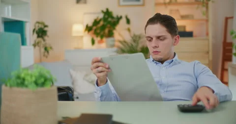 Upset Man Counts Bills Stock Footage 276366506