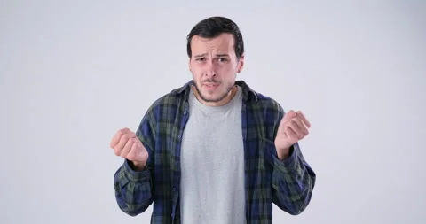 Upset Man feeling confusing on looking at something strange 库存影片 143944473