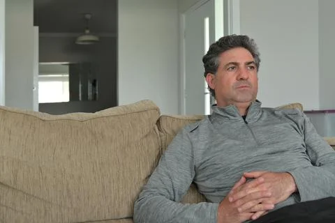 Upset man with puzzled face expression Stock Photos